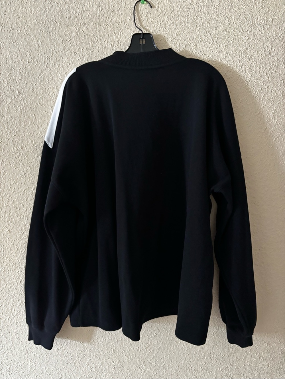 Men's Black V-Neck Sweater with White Geometric Accents - Picture 4 of 7